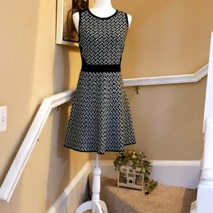 If medium is a fit try this sleeveless dress